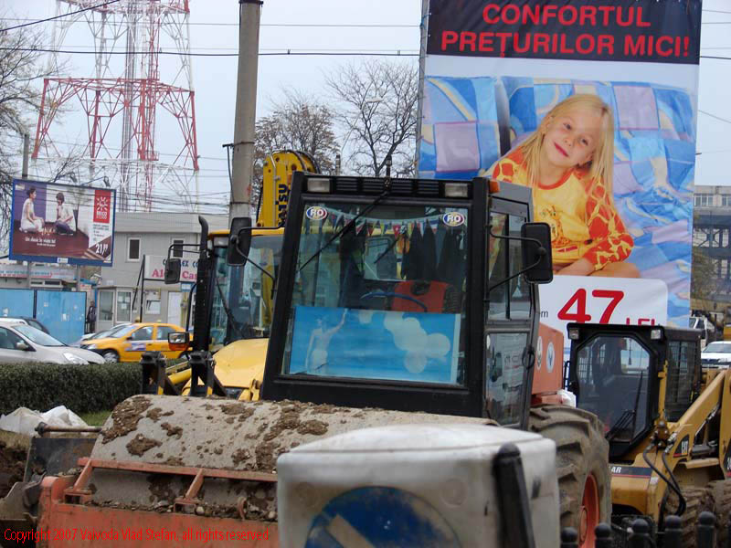 Vaivoda Vlad Stefan fotograf in Romania afis Cora utilaje constructii intersectie sens giratoriu Piata Sudului lucrari carosabil soseaua Oltenitei sector 4 Bucuresti 2007