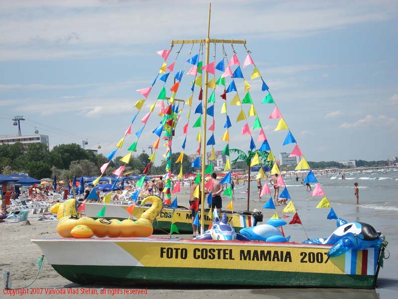 Pe plaja Foto Costel Mamaia 2007 Constanta Vaivoda Vlad fotograf in Romania turism turist litoral vara mal servicii foto